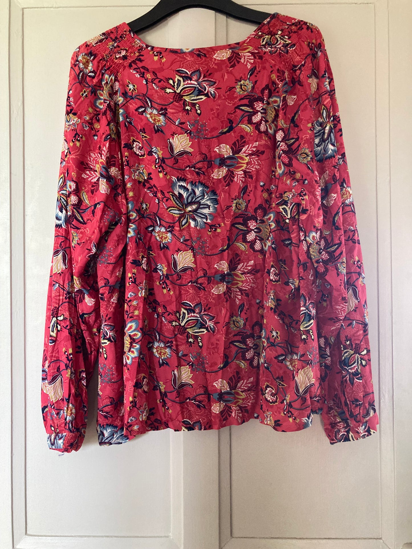 Blouse rose manches longues à motif