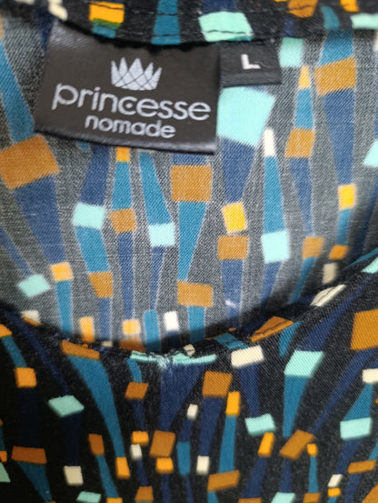 Magnifique haut aux motifs lumineux et graphiques
