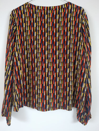 Belle blouse aux tons jaune orangé