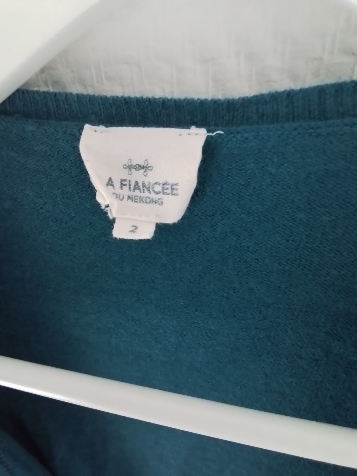 Gilet cache cœur ceinturée coloris bleu pétrole